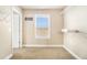 Walk-in closet with shelving, carpet, and window with scenic view at 3621 Guinevere Trce, Douglasville, GA 30135