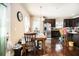 Kitchen area with stainless steel refrigerator and a dining table at 3621 Guinevere Trce, Douglasville, GA 30135