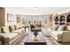 Spacious living room featuring neutral paint, carpet floors, and large windows that provide natural light at 3621 Guinevere Trce, Douglasville, GA 30135