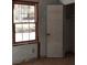 Bedroom showing closet and window for natural light ready for renovation at 4195 Turner Dr, Cumming, GA 30040