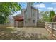 Backyard with wooden fence, spacious yard and second story deck at 5755 Vinings Place Se Ct, Mableton, GA 30126
