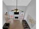 Open living room with a fireplace, hardwood floors, and lots of natural light at 5755 Vinings Place Se Ct, Mableton, GA 30126
