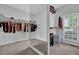 Spacious walk-in closet with ample storage and a mirror at 5755 Vinings Place Se Ct, Mableton, GA 30126