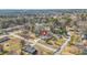 Expansive aerial view of the home showcasing its in-ground pool and neighborhood setting at 897 Marie Sw Ln, Conyers, GA 30094