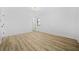 Inviting bedroom featuring light wood floors and crisp white walls, offering a clean, modern look at 897 Marie Sw Ln, Conyers, GA 30094