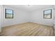 Bright bedroom with ample natural light and modern flooring at 897 Marie Sw Ln, Conyers, GA 30094