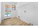 Bright laundry room features new vinyl floors, a door that leads to a pool, and washer/dryer hookups at 897 Marie Sw Ln, Conyers, GA 30094