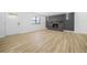 Bright living room featuring a stylish fireplace and neutral decor at 897 Marie Sw Ln, Conyers, GA 30094