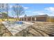 A backyard pool with a patio, showcasing an outdoor living space with a covered porch at 897 Marie Sw Ln, Conyers, GA 30094