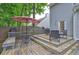 Backyard deck with an umbrella, grill, and outdoor seating creating an ideal space for entertaining at 1160 Haven Brook Ne Way, Brookhaven, GA 30319