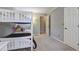 Neutral bedroom featuring a white bunk bed with carpeted floor and white closet door at 1160 Haven Brook Ne Way, Brookhaven, GA 30319