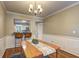 A cozy dining area with wood floors, and a breakfast bar offers a casual eating space at 1160 Haven Brook Ne Way, Brookhaven, GA 30319