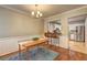 The dining room is beautifully appointed with wood floors and adjacent breakfast bar and kitchen access at 1160 Haven Brook Ne Way, Brookhaven, GA 30319