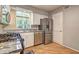 Modern kitchen featuring stainless steel appliances, granite countertops, and a bright window at 1160 Haven Brook Ne Way, Brookhaven, GA 30319