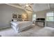 A spacious main bedroom is complete with vaulted ceilings, a ceiling fan and plush carpeting at 1160 Haven Brook Ne Way, Brookhaven, GA 30319