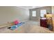 Bright, neutral office area with large desk, lamps, plants, and exercise equipment at 1160 Haven Brook Ne Way, Brookhaven, GA 30319
