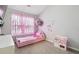 bedroom with a pink bed, butterfly decorations, and play kitchen at 20 Pine Canyon Sw Dr # 26, Atlanta, GA 30331