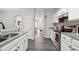 Modern kitchen with stainless steel appliances, granite countertops, and hardwood floors at 20 Pine Canyon Sw Dr # 26, Atlanta, GA 30331