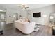 Open-concept living room with dining area, hardwood floors, and modern decor at 20 Pine Canyon Sw Dr # 26, Atlanta, GA 30331