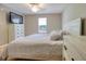 Cozy bedroom features a large TV on a dresser and natural light at 213 Johnstons Dr, Dallas, GA 30157