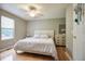 Bright bedroom features hardwood floors, a large window, and a neutral color scheme at 213 Johnstons Dr, Dallas, GA 30157