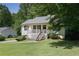 Cozy home with a inviting front porch and yard, perfect for relaxing and enjoying the outdoors at 213 Johnstons Dr, Dallas, GA 30157