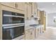 Modern kitchen features stainless steel appliances, light wood cabinets, and ample counter space at 2592 Alcovy Ne Trl, Marietta, GA 30066