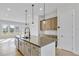 Modern kitchen island features bar seating, stainless steel appliances, and generous counter space at 2592 Alcovy Ne Trl, Marietta, GA 30066