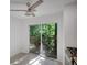 Bright dining area featuring a sliding glass door leading to a deck, adjacent to a stove at 293 Quail Run, Roswell, GA 30076