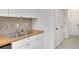 Kitchen with stainless sink, stainless appliances and lots of storage at 293 Quail Run, Roswell, GA 30076