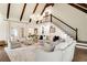 Spacious living room with high ceilings, hardwood floors, a fireplace, and comfortable seating at 1018 Layfield Ct, Dunwoody, GA 30338