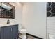 Updated full bathroom with stylish vanity and modern shower design at 11 Peyton Place Sw, Atlanta, GA 30311