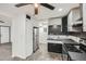 Modern kitchen design with stainless steel appliances and black and white cabinets at 11 Peyton Place Sw, Atlanta, GA 30311