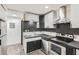 Well-equipped kitchen with stainless steel appliances and sleek backsplash at 11 Peyton Place Sw, Atlanta, GA 30311