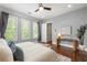 Spacious bedroom with ceiling fan, natural light, and stylish decor at 1202 Hardee Ne St, Atlanta, GA 30307