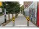Scenic view of the sidewalk near the property, surrounded by mature trees and colorful murals at 1202 Hardee Ne St, Atlanta, GA 30307