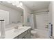 Well-lit bathroom with a large mirror, modern vanity, and a shower-tub combination with neutral accents at 139 Treeline Trl, Canton, GA 30115