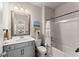 Classic bathroom design features a single sink vanity and shower-tub combo at 139 Treeline Trl, Canton, GA 30115