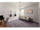Stylish bedroom setup features a comfortable seating area, carpet flooring, and modern lighting at 139 Treeline Trl, Canton, GA 30115
