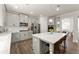 Beautiful kitchen featuring stainless steel appliances, gray cabinets, and an island with seating at 139 Treeline Trl, Canton, GA 30115