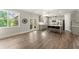 Expansive open-concept living space seamlessly connects the living room and kitchen, perfect for entertaining at 139 Treeline Trl, Canton, GA 30115