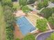 Community park features a playground, picnic area, and a tennis court surrounded by mature trees at 5650 Buckleigh Pointe, Suwanee, GA 30024