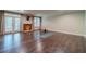 Spacious basement area with hardwood floors and fireplace provides a versatile living space at 5650 Buckleigh Pointe, Suwanee, GA 30024