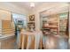 Spacious home foyer featuring hardwood floors, staircase, and an elegant table at 5650 Buckleigh Pointe, Suwanee, GA 30024