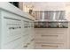 Custom kitchen cabinets with stainless steel range and marble countertops at 5650 Buckleigh Pointe, Suwanee, GA 30024