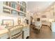 Charming kitchen with an adjacent built-in desk area and hardwood flooring at 5650 Buckleigh Pointe, Suwanee, GA 30024