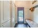 Well-organized mud room with ample storage, bench seating, and access to the outdoors at 5650 Buckleigh Pointe, Suwanee, GA 30024