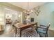 Spacious office with hardwood floors, decorative accents and chandelier lighting at 5650 Buckleigh Pointe, Suwanee, GA 30024