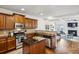 Well-lit kitchen boasts stainless appliances, dark granite counters, and an island workspace at 1229 Concord Se Rd, Smyrna, GA 30080
