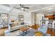 Spacious living room seamlessly connected to the kitchen, featuring modern furnishings and ample natural light at 1229 Concord Se Rd, Smyrna, GA 30080